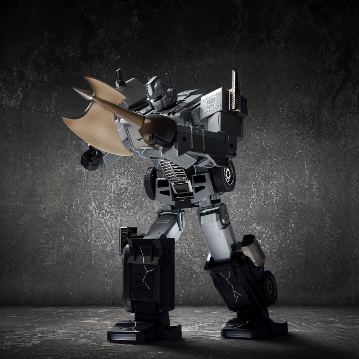 A picture of the Robosen Fallen Leader Optimus Prime with his iconic Energon axe.
